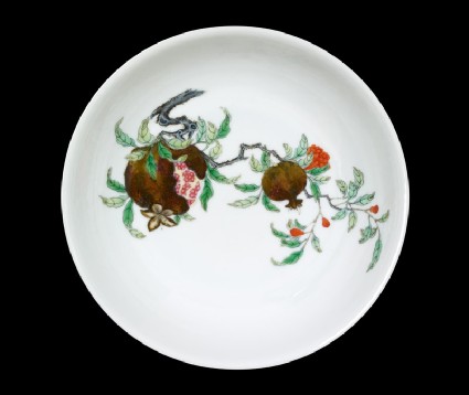 Bowl with a pomegranate spray, plum blossoms, and bambootop