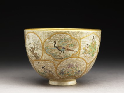 Satsuma tea bowl with animals, plants, and figuresside