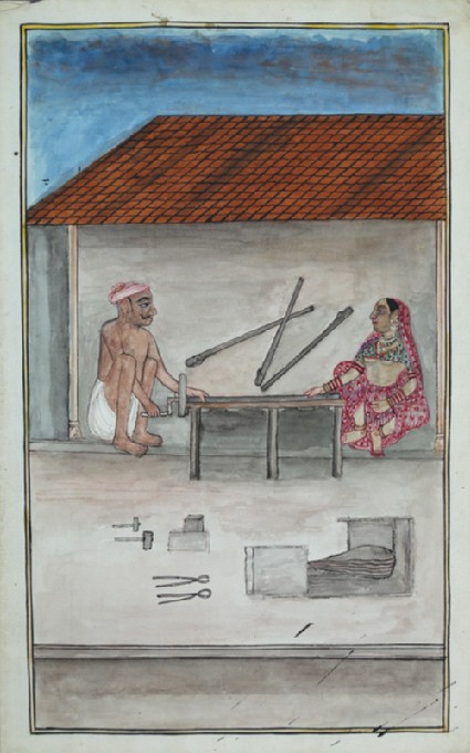 Man and woman in a workshopfront