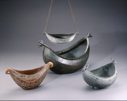 Kashkul, or begging bowl, in the form of a boatoblique with EA1959.10, EA1978.153 and EA1992.31
