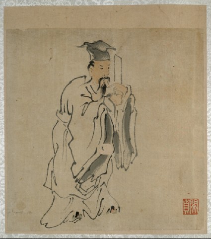 A scholar sitting on a futonfront