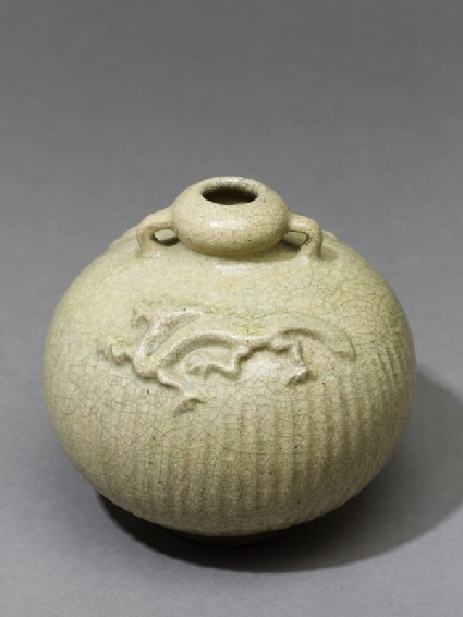 Greenware jar with dragons in reliefoblique