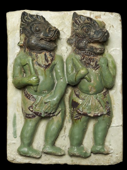 Plaque with demon-headed warriorsfront