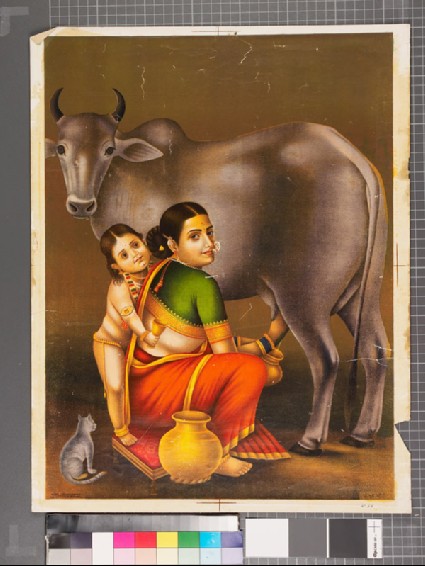 Mother and child milking the cowfront