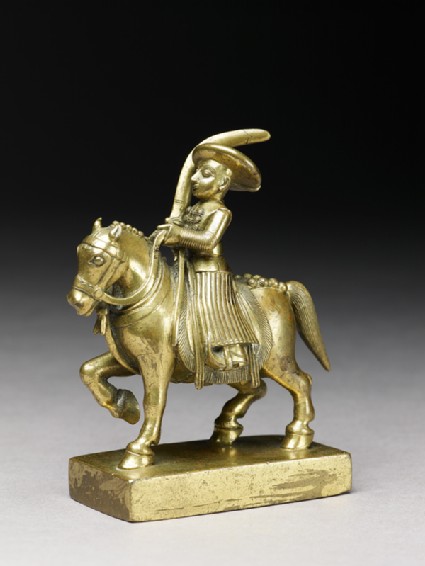 Toy soldier with horse and sabreside
