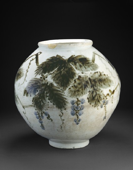 Vase with grape vineside