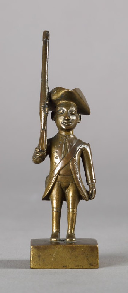 Toy European infantryman with tricorn hat and riflefront