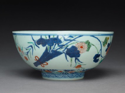 Bowl with chrysanthemums, poppies, and grassesside