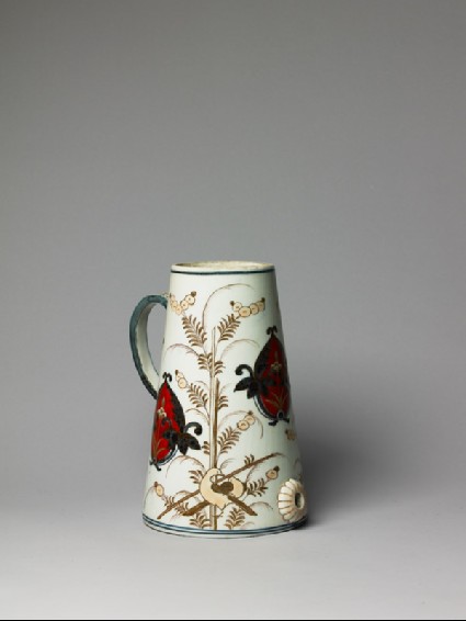 Coffee pot with floral spraysside