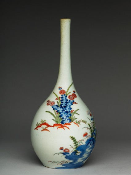 Bottle with flowers and grassesside