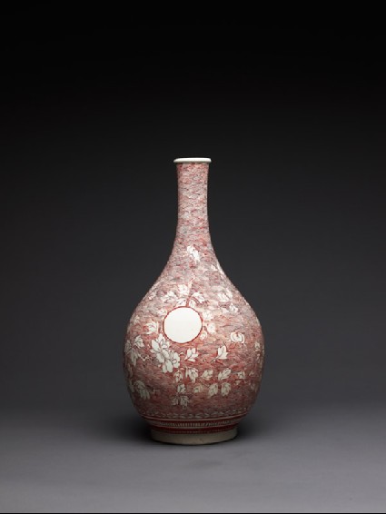 Bottle with peony decoration and three empty cartouchesside