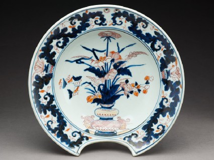 Barber's bowl depicting flowers in a vasetop