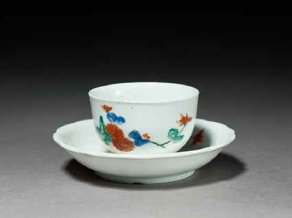 Cup and saucer with chrysanthemum spraysoblique, cup and saucer
