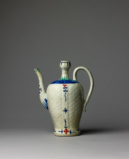 Ewer with wave pattern and stylized floral decorationside