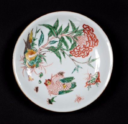 Dish with plant, hen, and six chicksfront