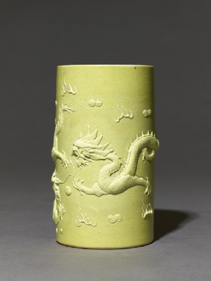 Brush pot with dragons in high reliefside