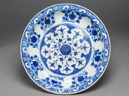 Dish with chrysanthemum sprays and lotus flowertop