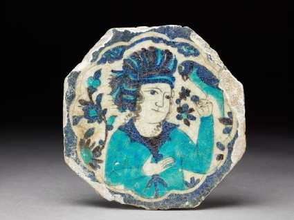 Octagonal tile with turbaned man holding a parrottop