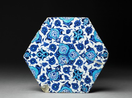 Hexagonal tile with floral decorationfront