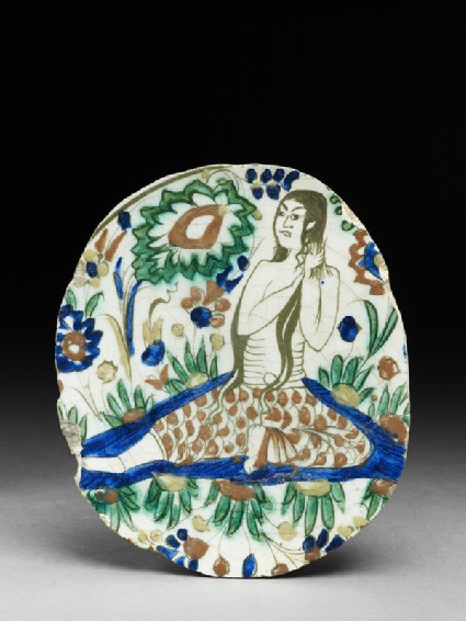 Base fragment of a dish depicting a woman combing her hairtop