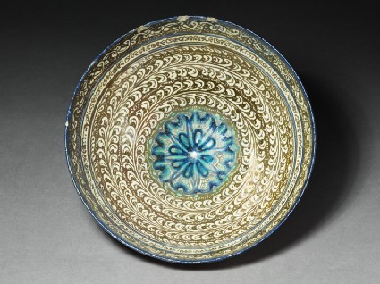 Bowl with vegetal decoration and central rosettetop