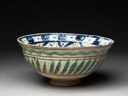 Bowl with central triangle and spiralling panelsoblique