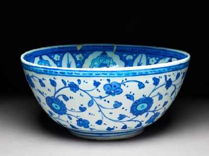 Bowl with six-pointed star, cypress trees, and prunus blossomoblique