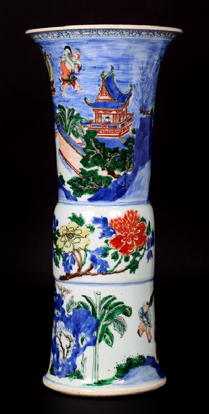 Beaker vase with flowers and figures in boatsfront