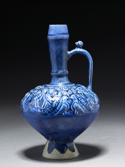 Jug with human-headed birds paired in roundelsside