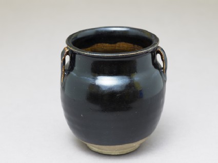 Black ware jar with black glazeoblique