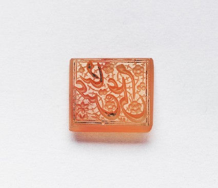 Rectangular bezel seal with nasta‘liq inscription and floral decorationfront