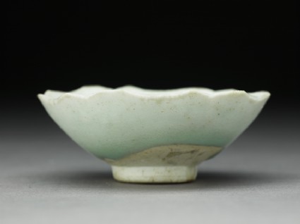 White ware cup with foliated rimside