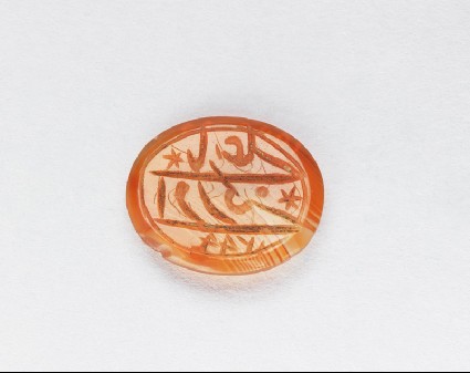 Oval bezel seal with inscription in cursive script and six-pointed starsfront
