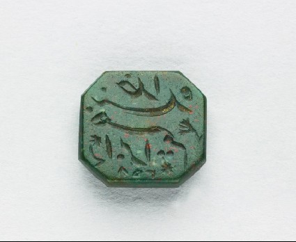 Octagonal bezel seal with nasta‘liq inscription, leaf, and star decorationfront
