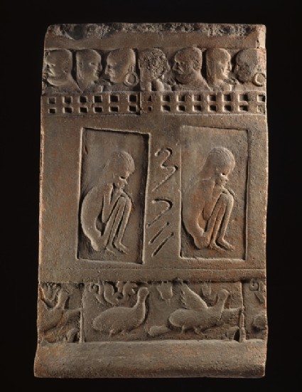 Terracotta tile with two ascetic figuresfront
