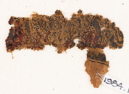 Textile fragment with naskhi inscription and circlesfront