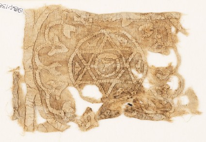 Textile fragment with roundel, star, and chalicefront