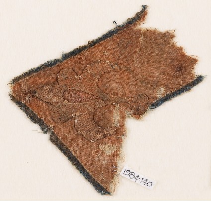 Textile fragment with flower-head and chevronfront