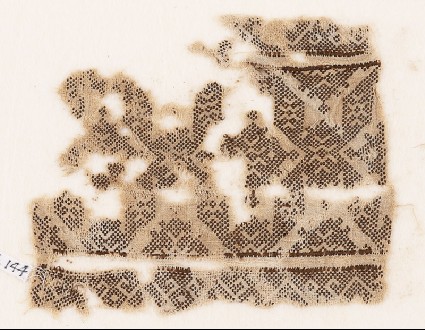Textile fragment with band of linked diamond-shapesfront