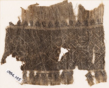 Textile fragment with band of hooks and diamond-shapesfront