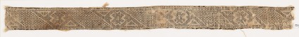 Textile fragment with bands of grids, crosses, and trianglesfront