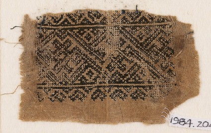 Textile fragment with interlacing crosses and diamond-shapesfront