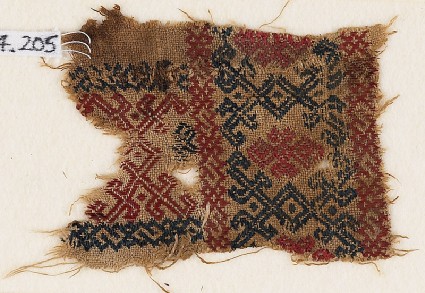 Textile fragment with interlaced diamond-shapesfront