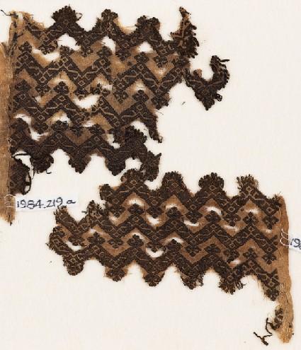 Textile fragment with chevrons and linked S-shapes and Z-shapesfront