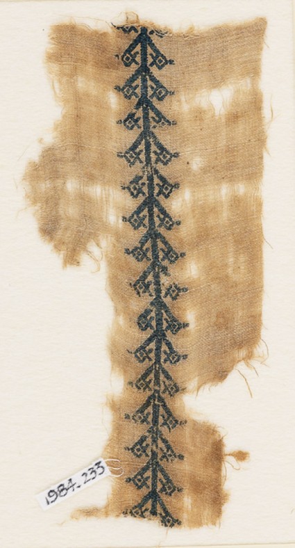 Textile fragment with pole and stylized flowersfront