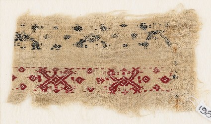 Textile fragment with bands of interlaced crosses and diamond-shapesfront