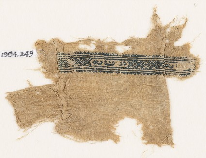 Textile fragment with hexagons, inscription, and diamond-shapesfront