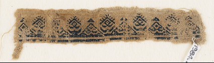 Textile fragment with triangles, inscription, diamond-shapes, and crescentsfront