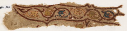 Textile fragment with tendrils and dragon headsfront