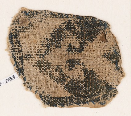 Textile fragment with chevron and trefoil peakfront